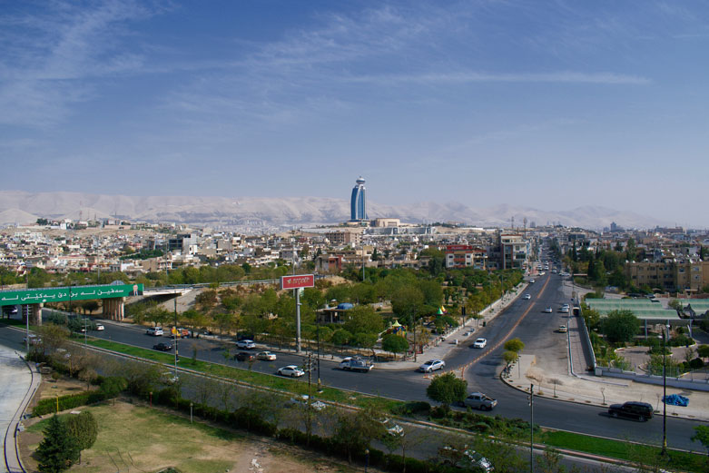 The Grand Millennium soars over Sulaimani’s rolling cityscape.